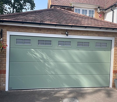 Express Garage Doors SECTIONAL-Teckentrup Solid Redrow colour