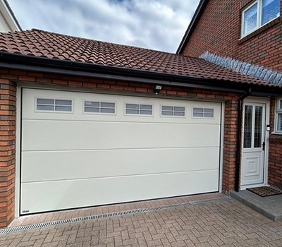 Express Garage Doors SECTIONAL-Teckentrup Solid in Pebble Grey